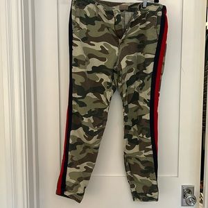 Mother “ Misfit” camouflage pants with navy and red stripe detail.
